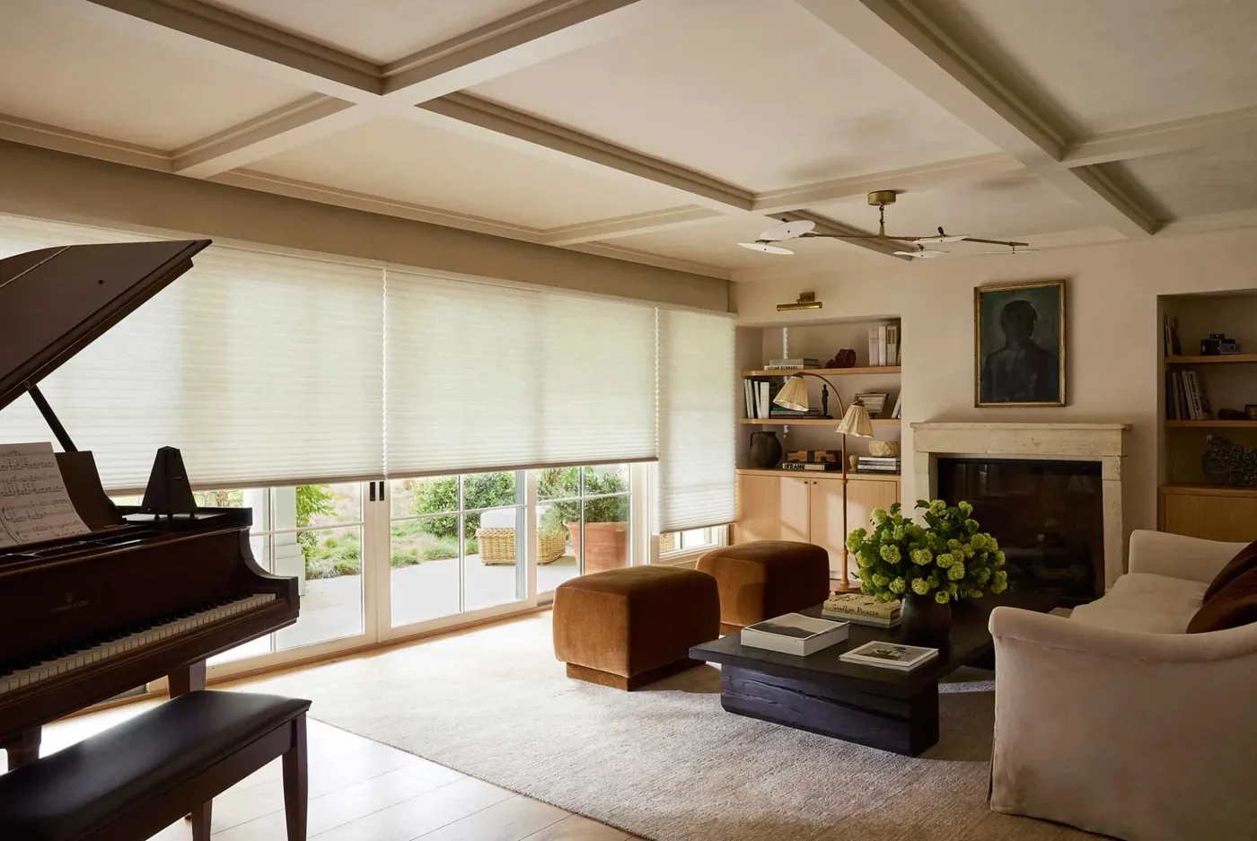 Living room with Hunter Douglas shades from OC Shutter and Blind Gallery